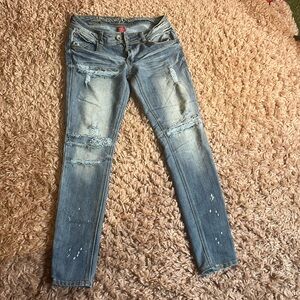 Distressed denim jeans